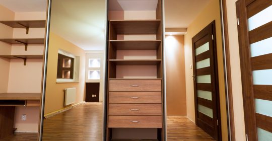 Wardrobe was mirrored sliding doors