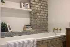 Bathroom renovation with original reclaimed bricks