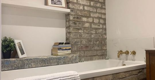 Bathroom renovation with original reclaimed bricks