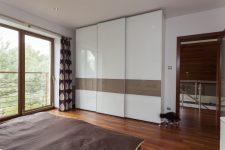 Wardrobe with high gloss sliding doors