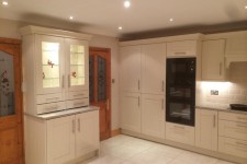 Kitchen with custom built pantry in cream