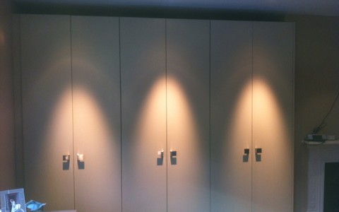 Custom built wardrobe with downlighters