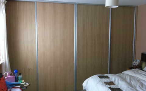 Wardrobes with wooden sliding doors