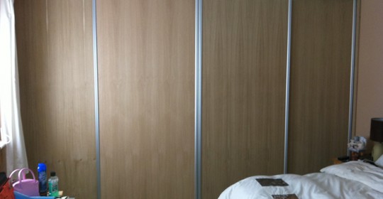 Wardrobes with wooden sliding doors